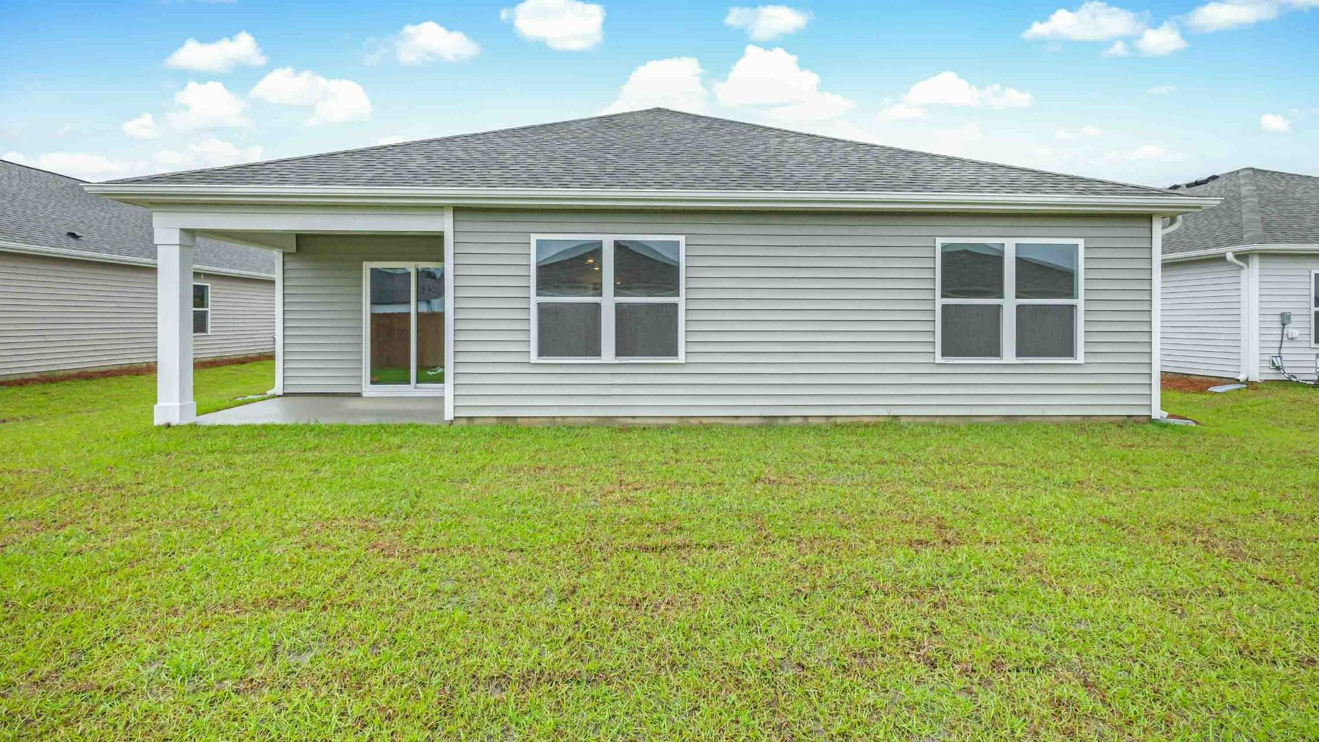 Enjoy the covered porch perfect for entertaining and enjoying the Carolina evenings.