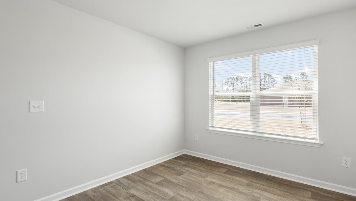 this floorplan was designed to make everyday living feel effortless. The heart of the home is the open kitchen, dining area, and family room that create a welcoming gathering space.