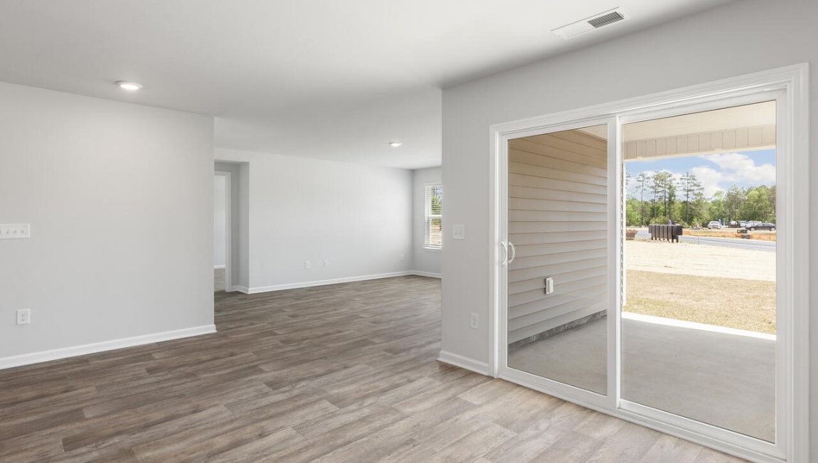 this floorplan was designed to make everyday living feel effortless. The heart of the home is the open kitchen, dining area, and family room that create a welcoming gathering space.