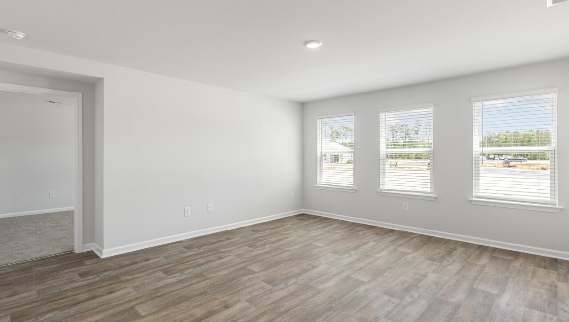 this floorplan was designed to make everyday living feel effortless. The heart of the home is the open kitchen, dining area, and family room that create a welcoming gathering space.