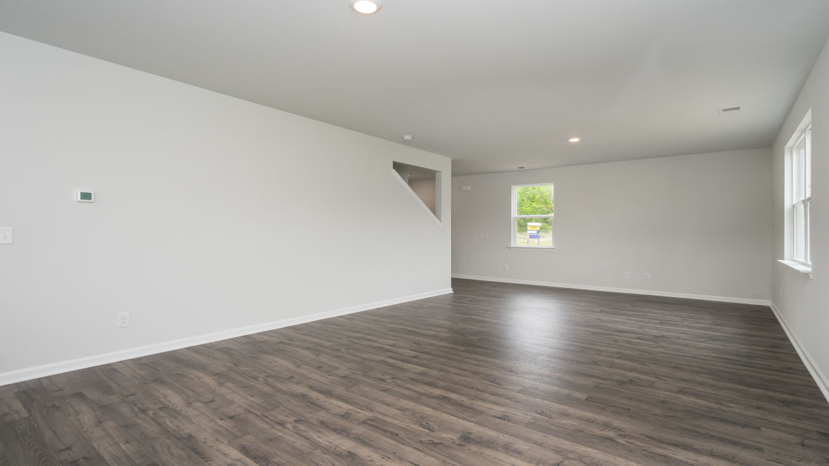 The living area is an open concept, where your kitchen, living, and dining areas blend seamlessly into a space perfect for everyday living and entertaining.