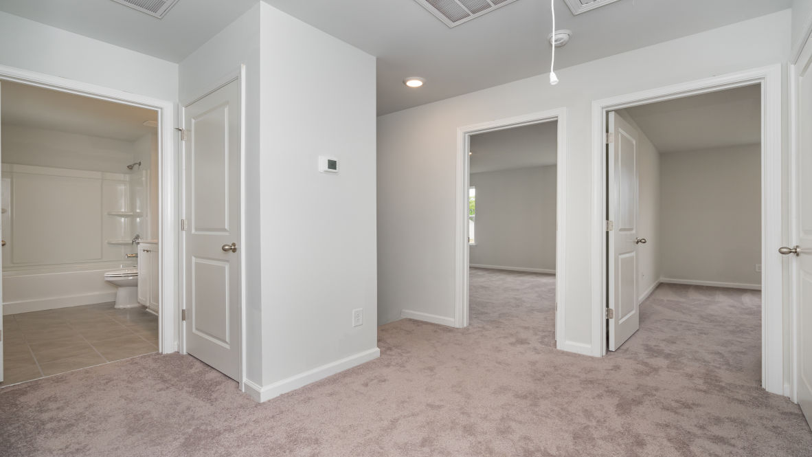 The primary bedroom is a perfect retreat with a walk-in closet and generous primary bathroom featuring a double vanity, large shower, and a separate linen closet. Plus, the laundry room is on the second floor with all the bedrooms!