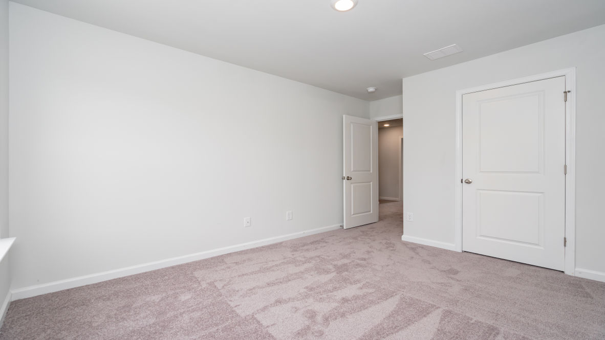 The primary bedroom is a perfect retreat with a walk-in closet and generous primary bathroom featuring a double vanity, large shower, and a separate linen closet. Plus, the laundry room is on the second floor with all the bedrooms!