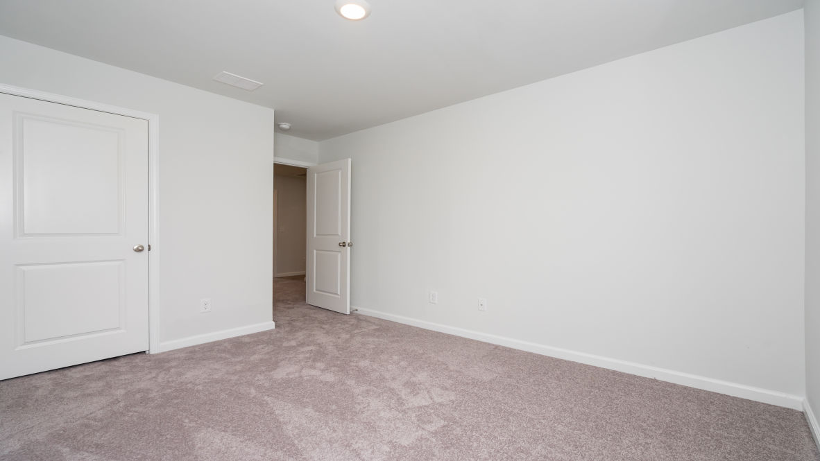 The primary bedroom is a perfect retreat with a walk-in closet and generous primary bathroom featuring a double vanity, large shower, and a separate linen closet. Plus, the laundry room is on the second floor with all the bedrooms!