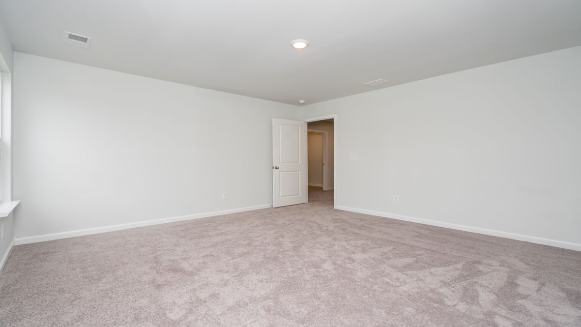 The primary bedroom is a perfect retreat with a walk-in closet and generous primary bathroom featuring a double vanity, large shower, and a separate linen closet. Plus, the laundry room is on the second floor with all the bedrooms!