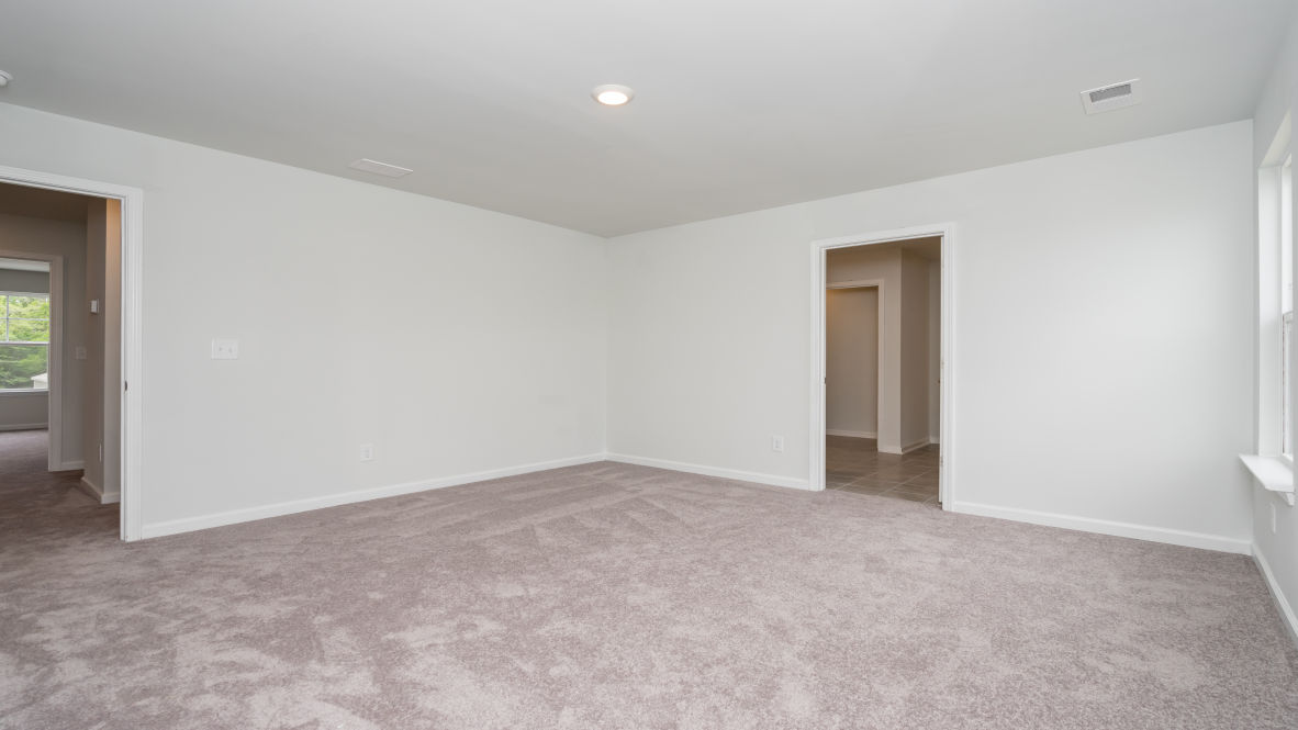 The primary bedroom is a perfect retreat with a walk-in closet and generous primary bathroom featuring a double vanity, large shower, and a separate linen closet. Plus, the laundry room is on the second floor with all the bedrooms!
