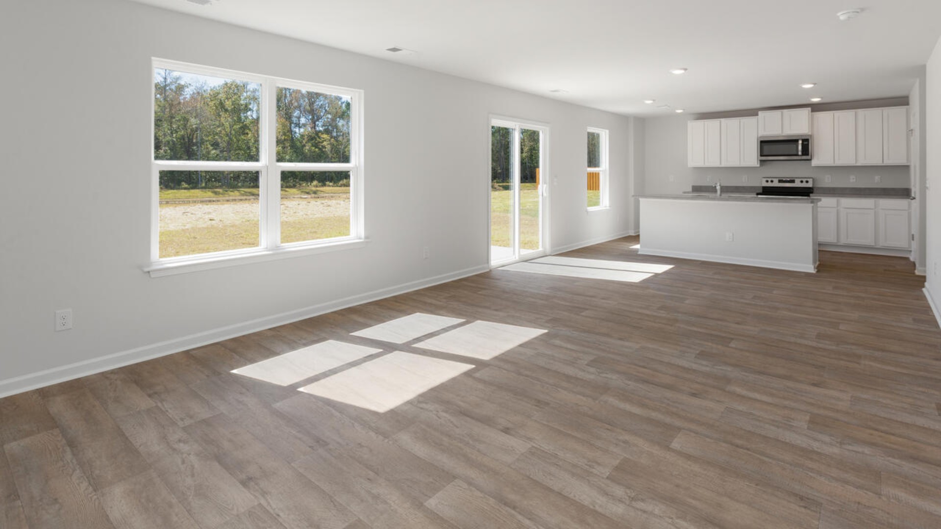 The living area is an open concept, where your kitchen, living, and dining areas blend seamlessly into a space perfect for everyday living and entertaining.