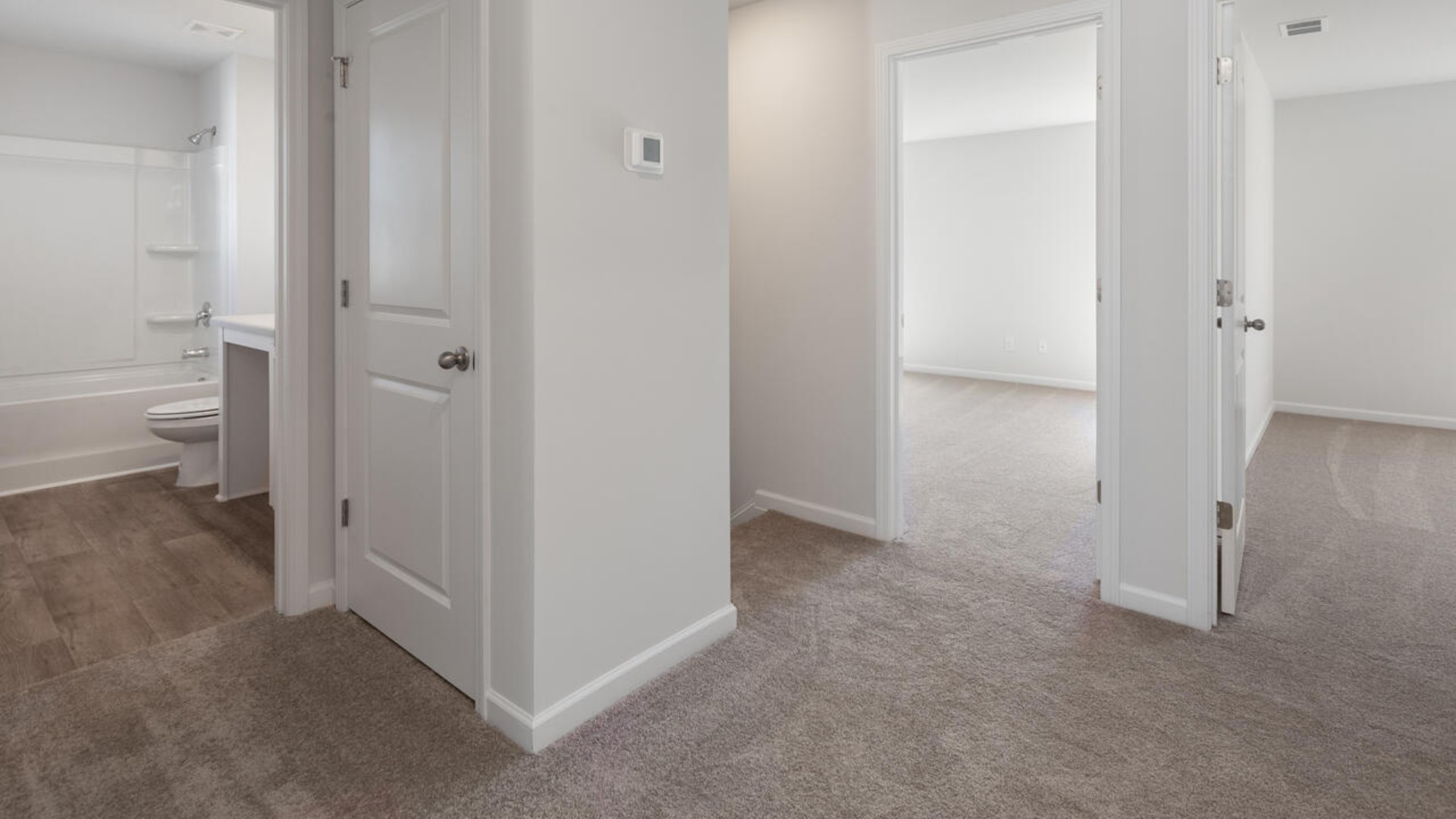 The primary bedroom is a perfect retreat with a walk-in closet and generous primary bathroom featuring a double vanity, large shower, and a separate linen closet. Plus, the laundry room is on the second floor with all the bedrooms!