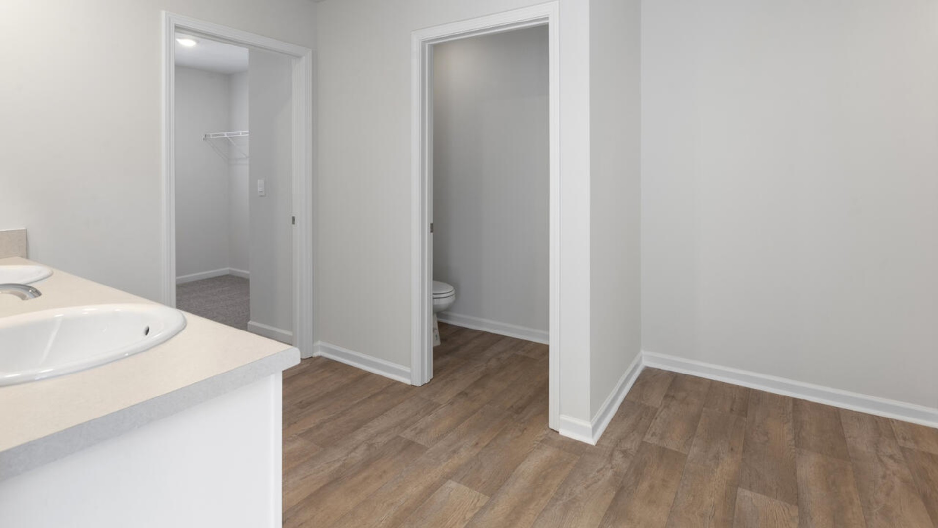 The primary bedroom is a perfect retreat with a walk-in closet and generous primary bathroom featuring a double vanity, large shower, and a separate linen closet. Plus, the laundry room is on the second floor with all the bedrooms!