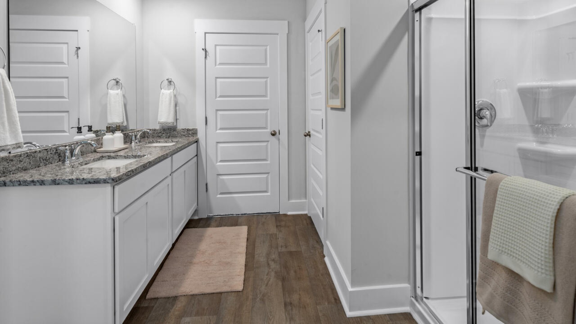 The upstairs has an additional living space, a laundry room, and a Primary Bedroom. Downstairs, a flex room can be used as an office or sitting area. In every bedroom you’ll have carpeted floors and a closet in each room. Whether these rooms become bedrooms, office spaces, or other bonus rooms, there is sure to be comfort