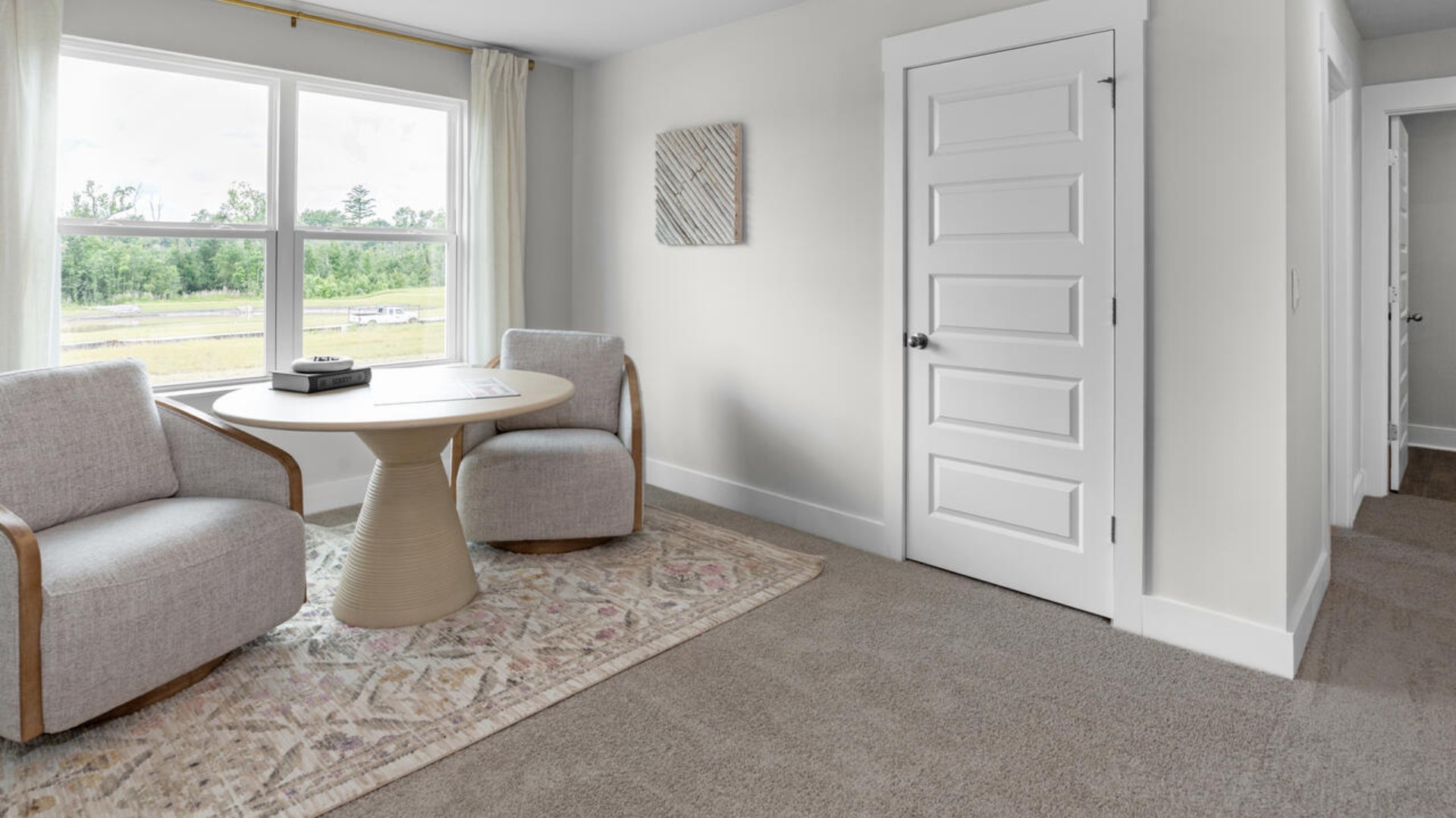 The upstairs has an additional living space, a laundry room, and a Primary Bedroom. Downstairs, a flex room can be used as an office or sitting area. In every bedroom you’ll have carpeted floors and a closet in each room. Whether these rooms become bedrooms, office spaces, or other bonus rooms, there is sure to be comfort