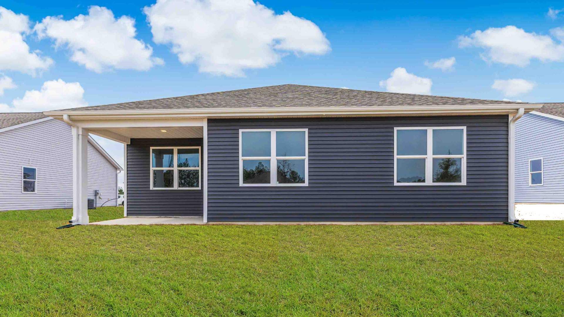 Enjoy the covered porch perfect for entertaining and enjoying the Carolina evenings.