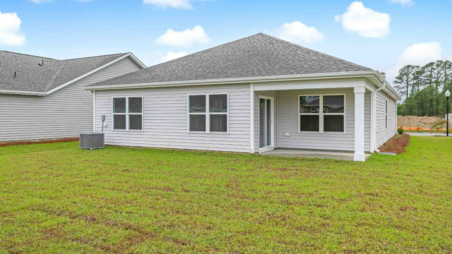 Enjoy the covered porch perfect for entertaining and enjoying the Carolina evenings.