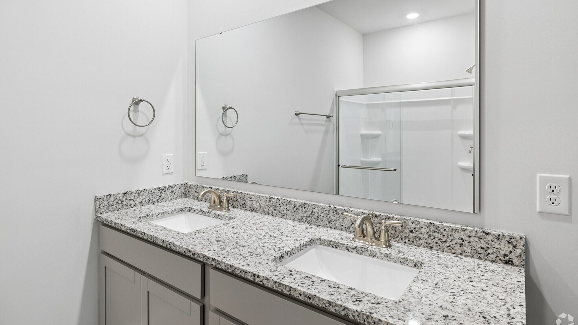 The Primary Suite offers a massive closet and a luxurious bathroom with a walk-in shower, linen closet, and dual vanity. In addition, there are another 2 bedrooms and full bath. I