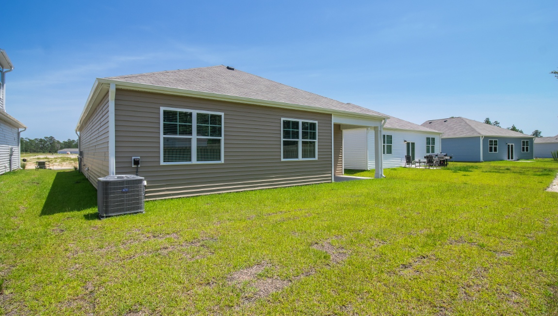 Enjoy the covered porch perfect for entertaining and enjoying the Carolina evenings