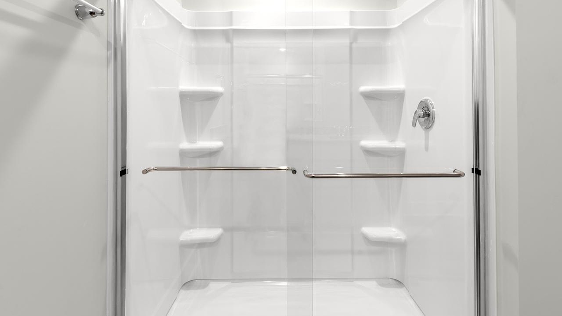 The primary suite offers a massive closet and a luxurious bathroom with a walk-in shower, linen closet, and dual vanity.