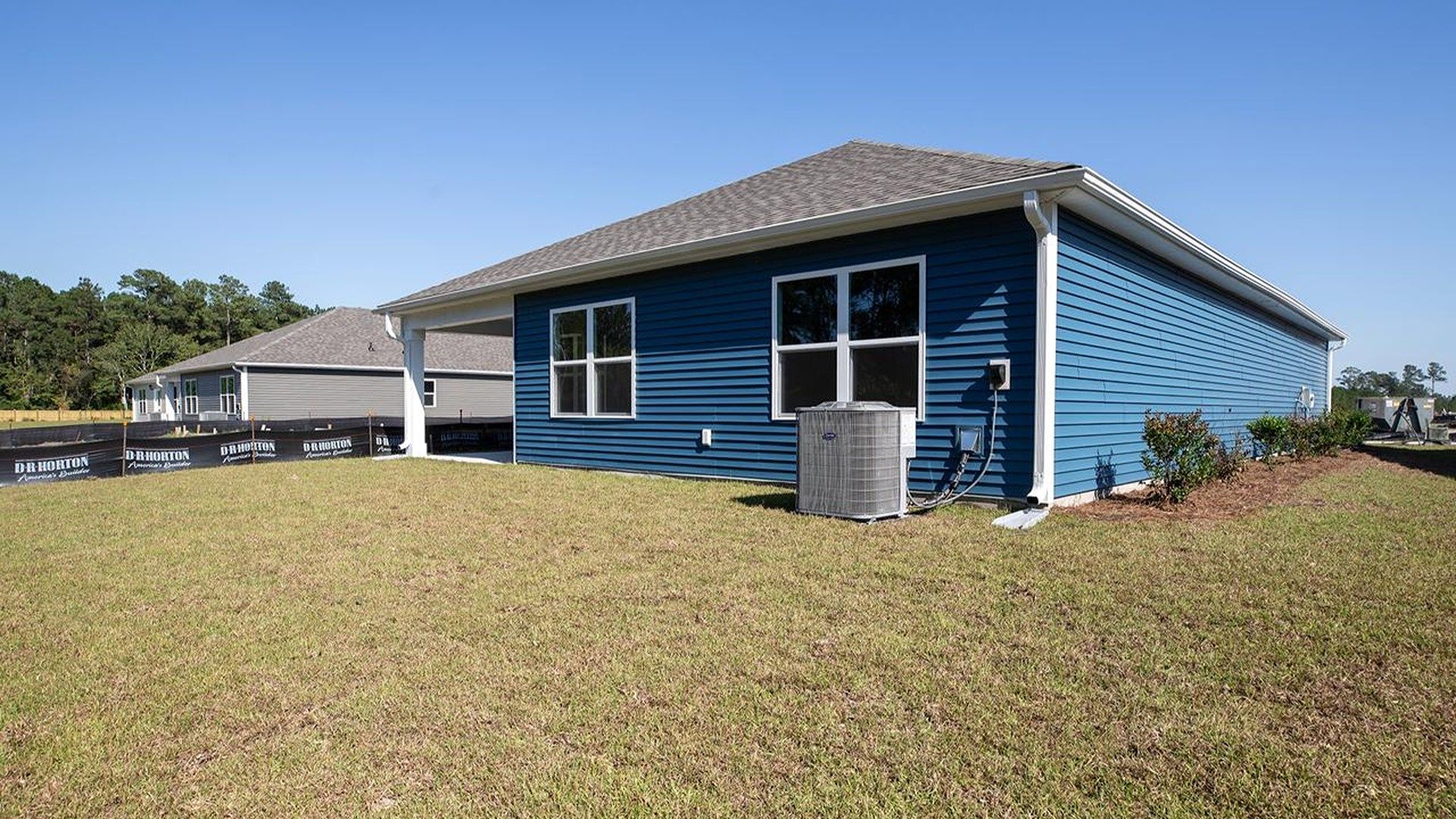 Enjoy the covered porch perfect for entertaining and enjoying the Carolina evenings.