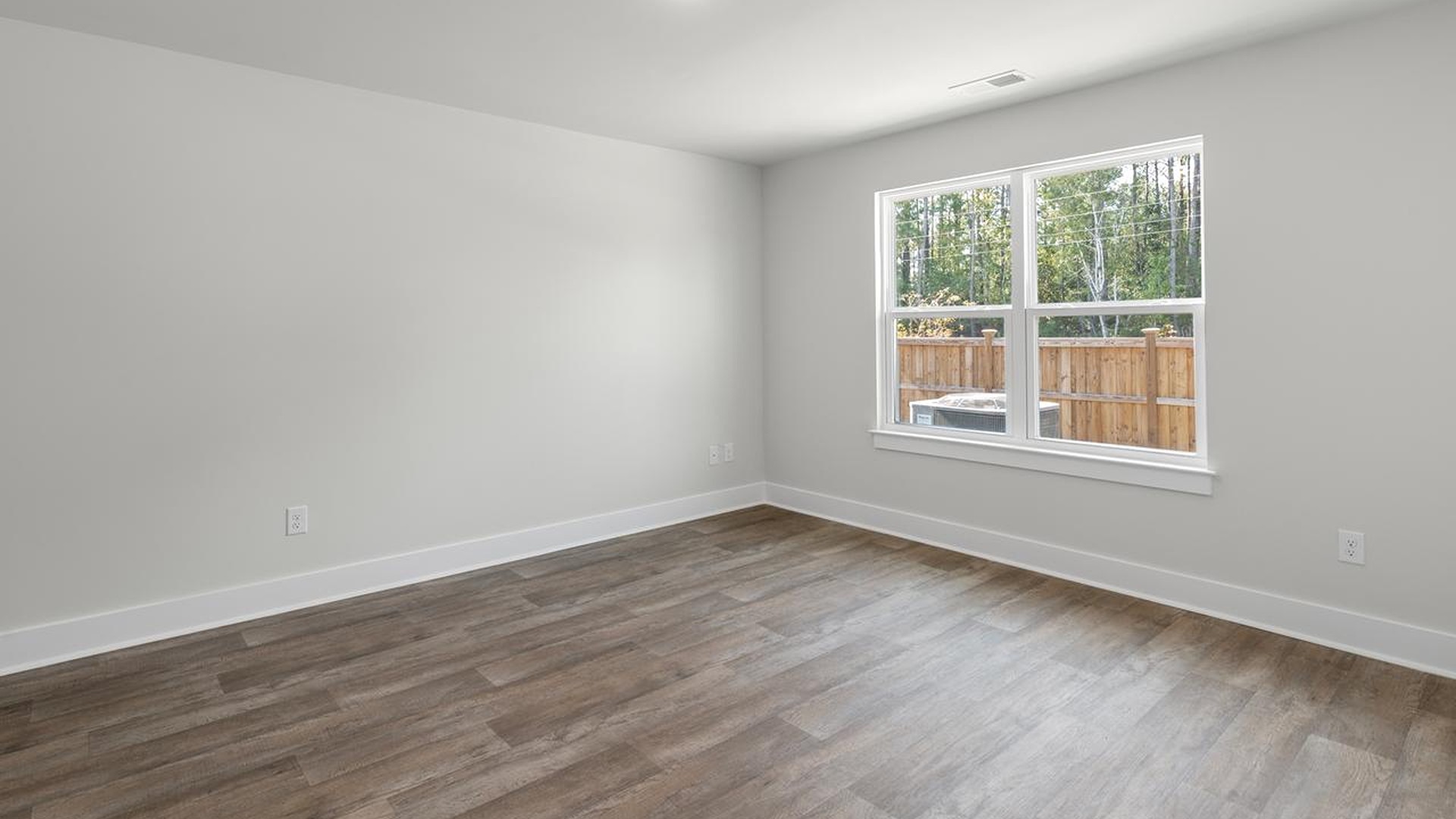 The primary suite offers a massive closet and a luxurious bathroom with a walk-in shower, linen closet, and dual vanity. In addition,