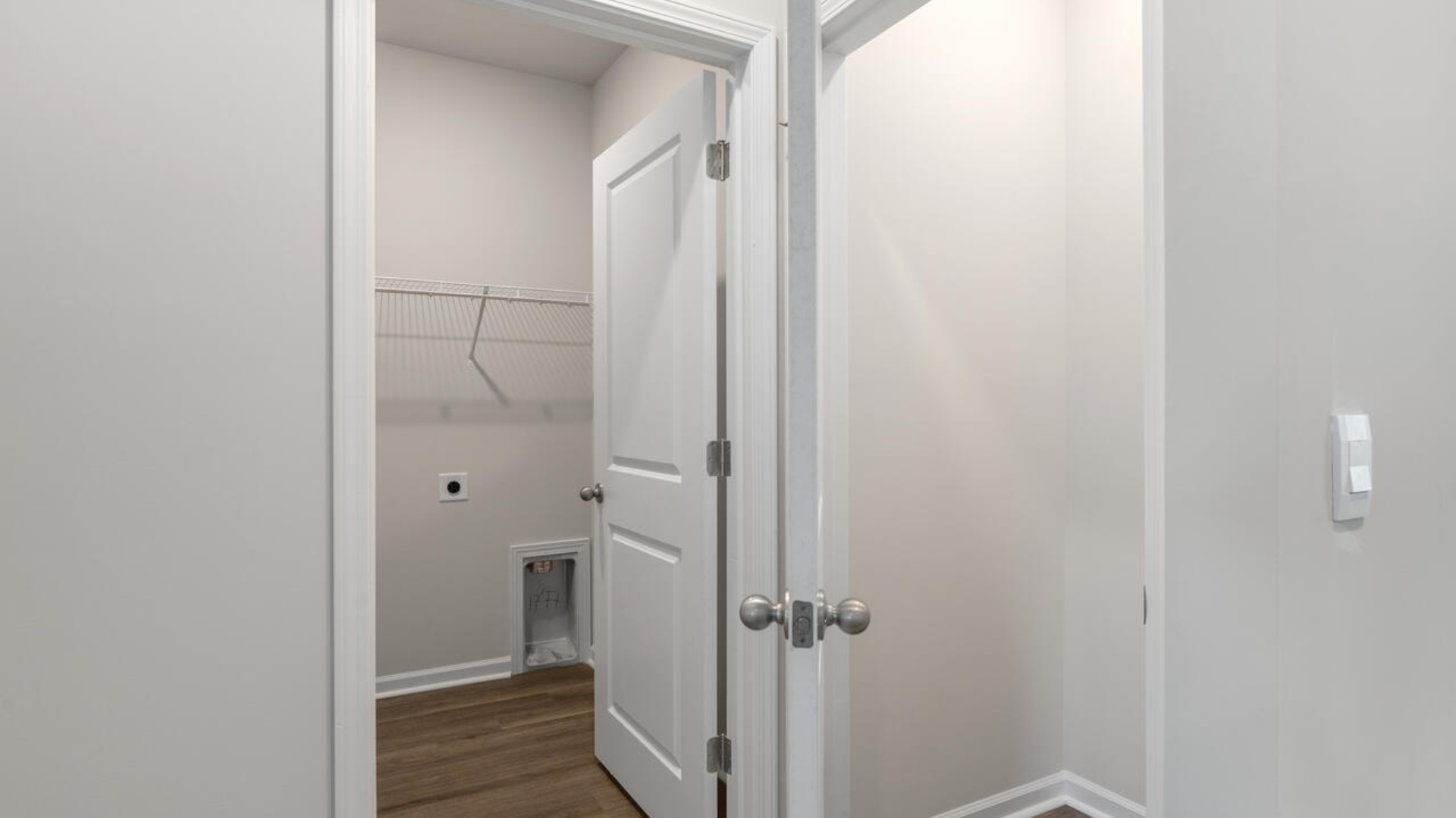 The Primary Suite offers a massive closet and a luxurious bathroom with a walk-in shower, linen closet, and dual vanity.