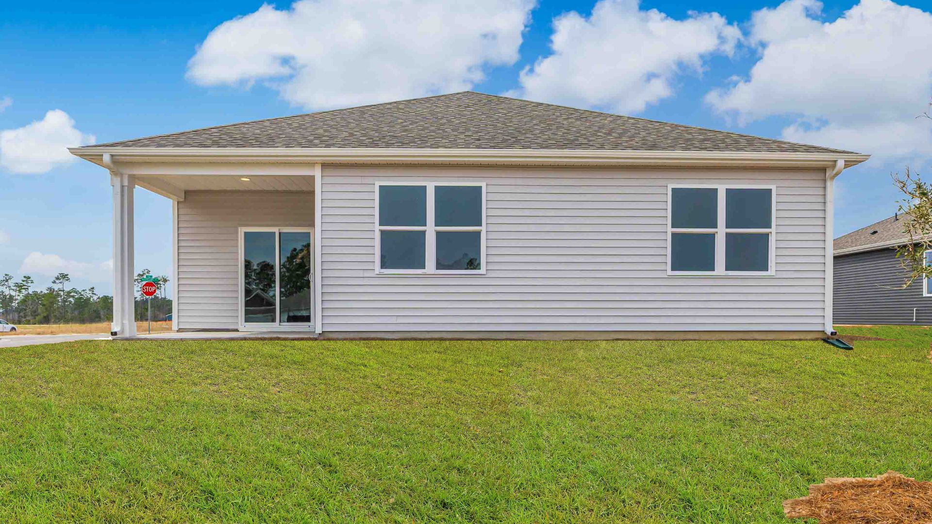 Enjoy the covered porch perfect for entertaining and enjoying the Carolina evenings.