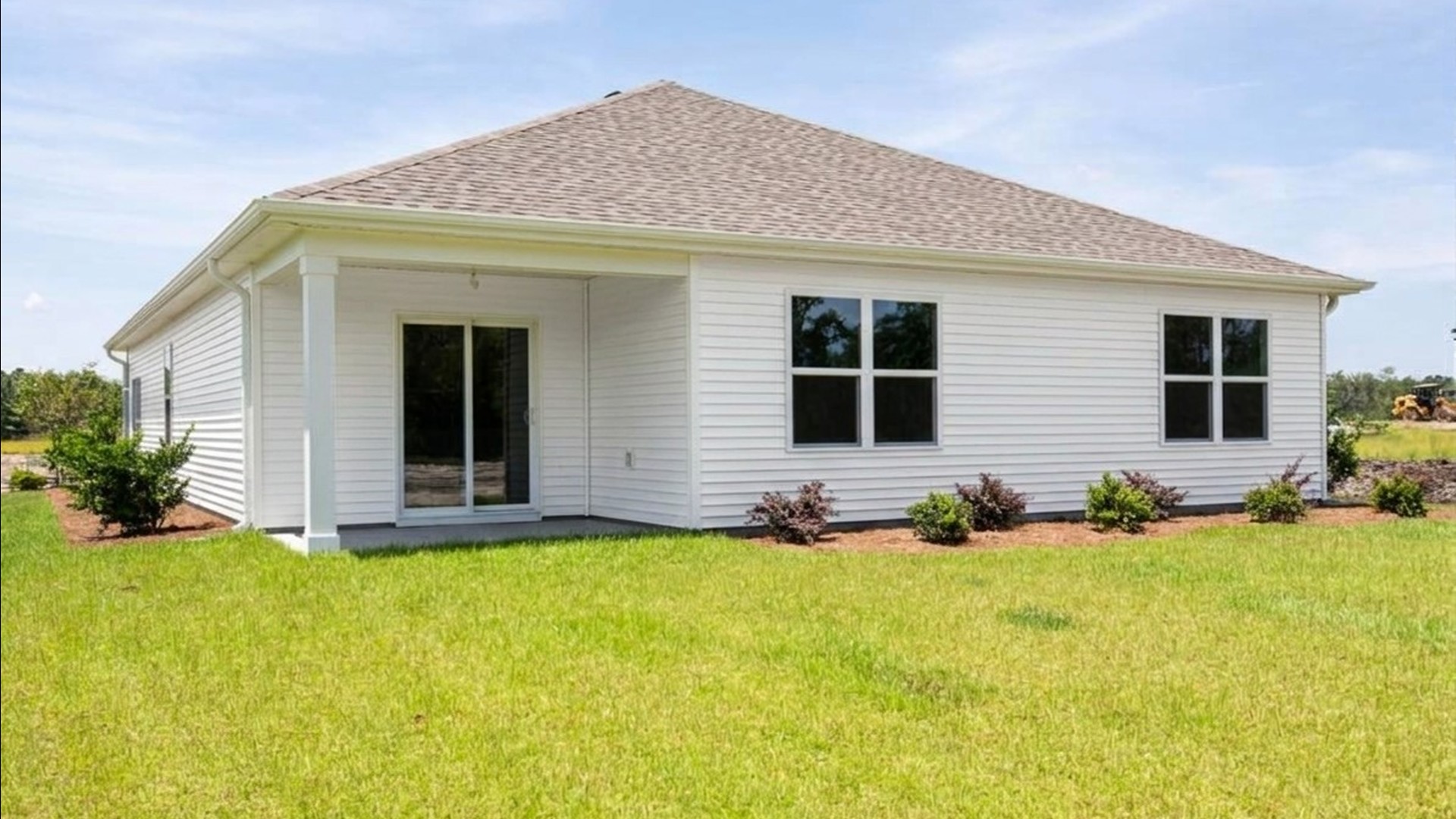 Enjoy the covered porch perfect for entertaining and enjoying the Carolina evenings.