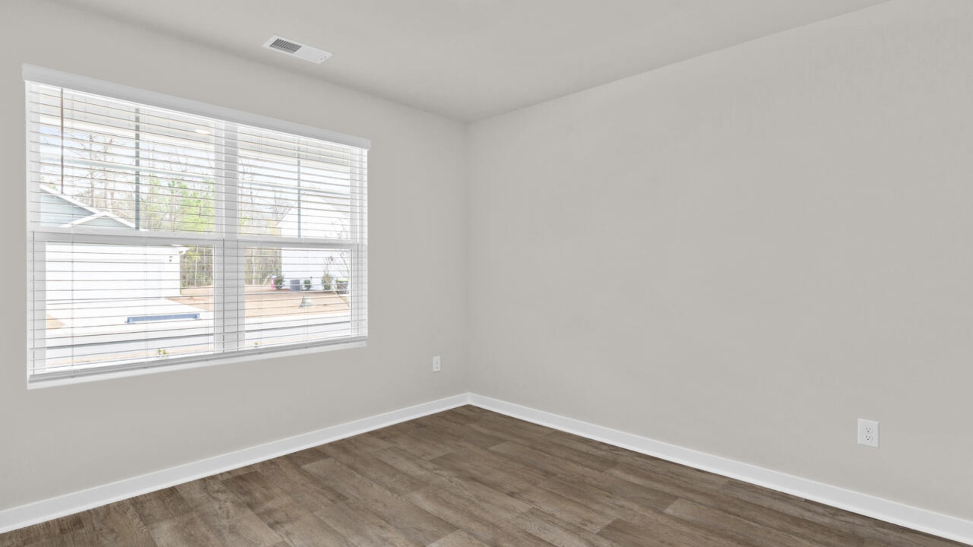 There are three additional bedrooms and full bath. In every bedroom you’ll have vinyl floors and a closet in each room.