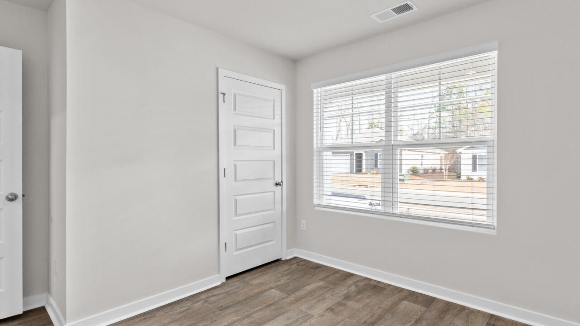 There are three additional bedrooms and full bath. In every bedroom you’ll have vinyl floors and a closet in each room.
