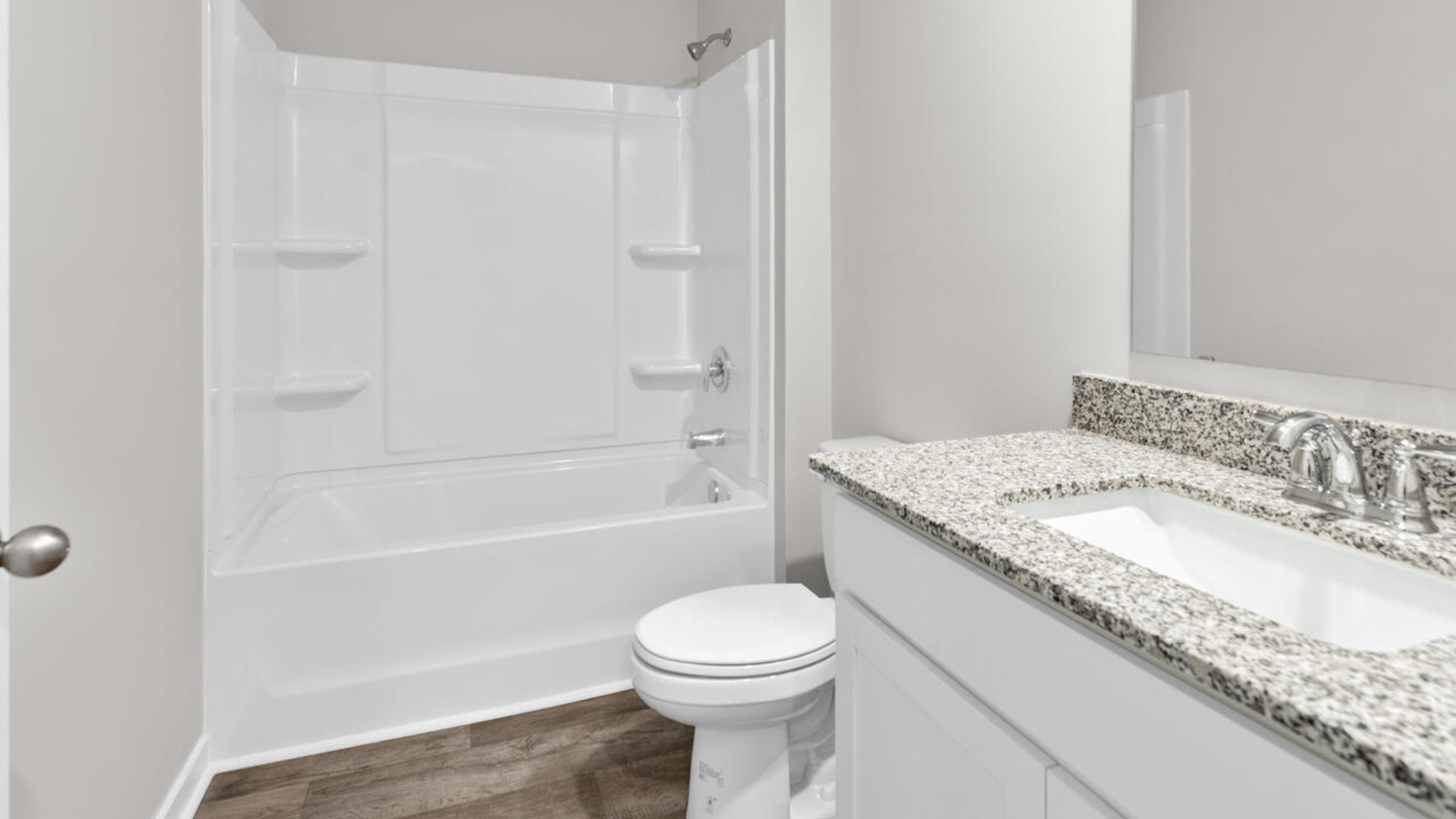 The primary bedroom has its own attached bathroom that features a walk-in closet and all the space you need to get ready in the morning.