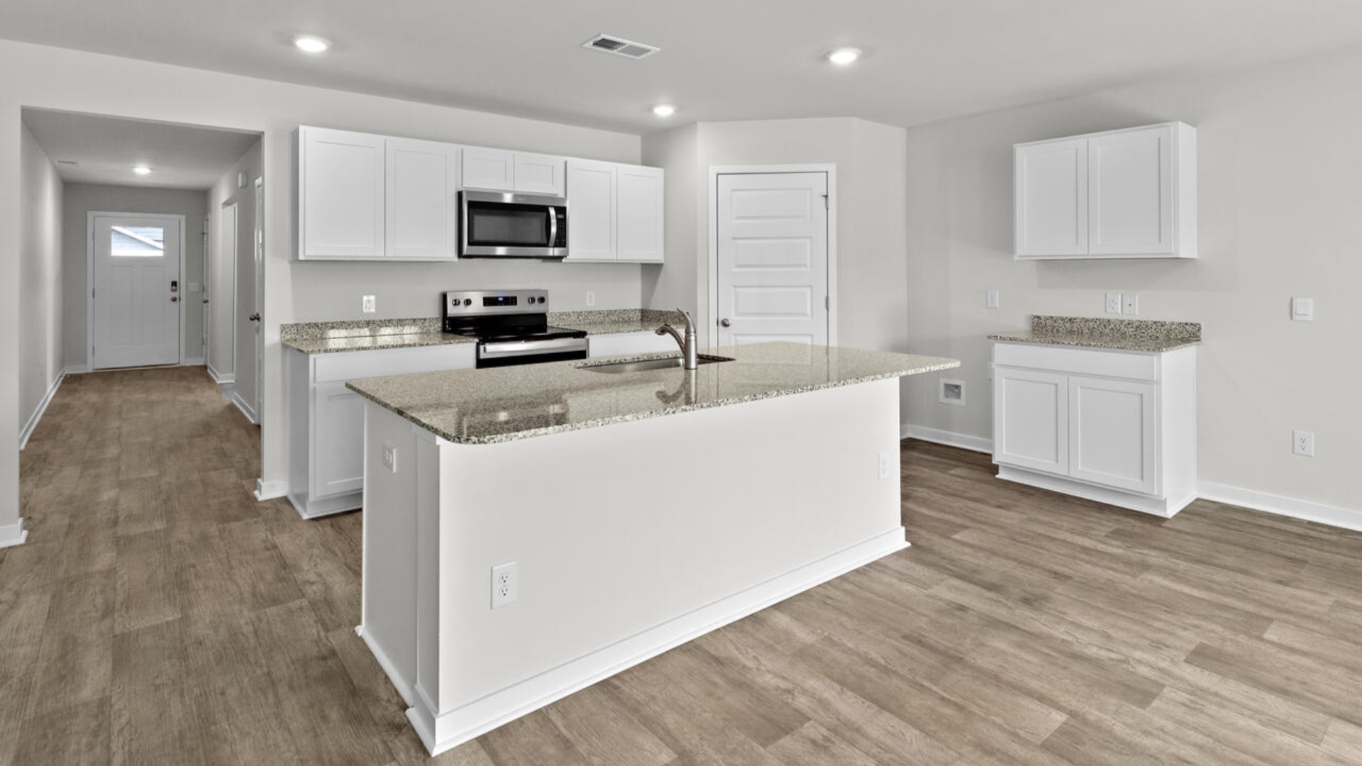 The Cali is one of our one-story floorplans featured in our The Merchant Point community in Jacksvonville, NC. With 2 modern exteriors to choose from, the Cali is sure to turn heads. To top it off, it's one of our floorplans that offers a 2-car garage.