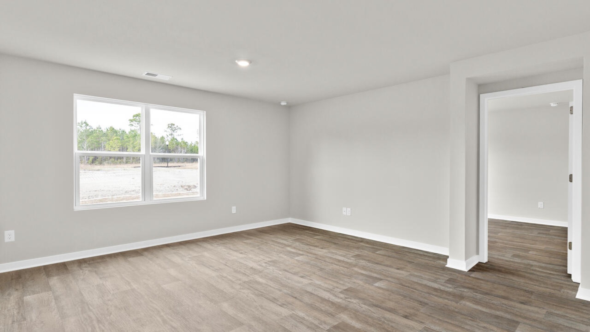 The primary bedroom has its own attached bathroom that features a walk-in closet and all the space you need to get ready in the morning.