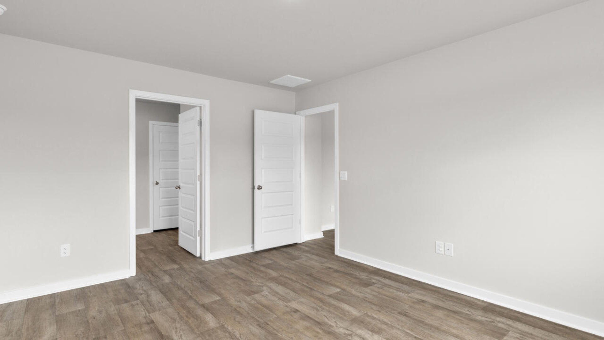 The primary bedroom has its own attached bathroom that features a walk-in closet and all the space you need to get ready in the morning.