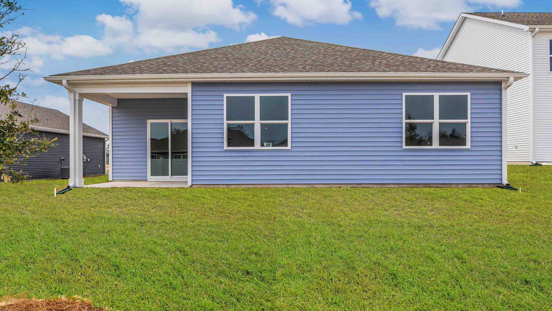 Enjoy the covered porch perfect for entertaining and enjoying the Carolina evenings.