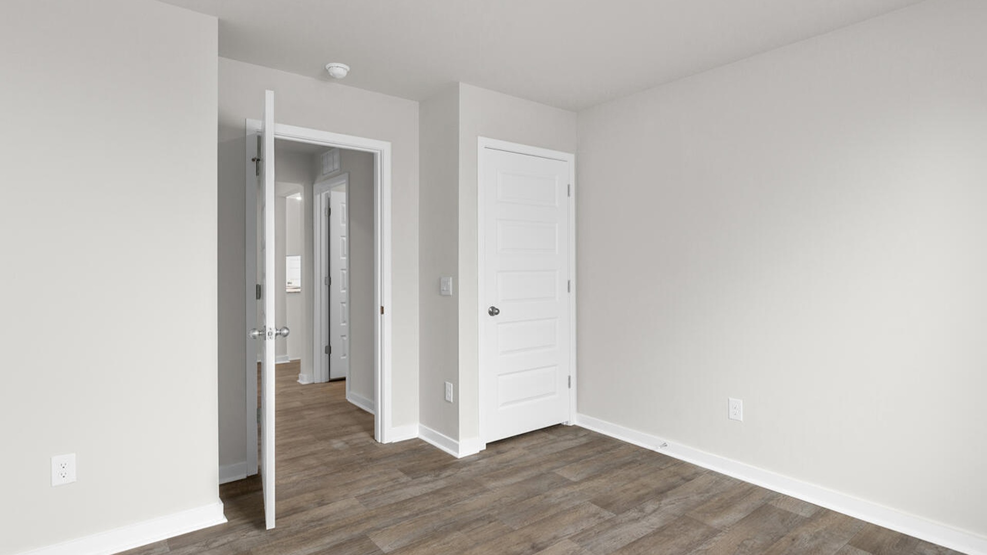 There are three additional bedrooms and full bath. In every bedroom you’ll have vinyl floors and a closet in each room.