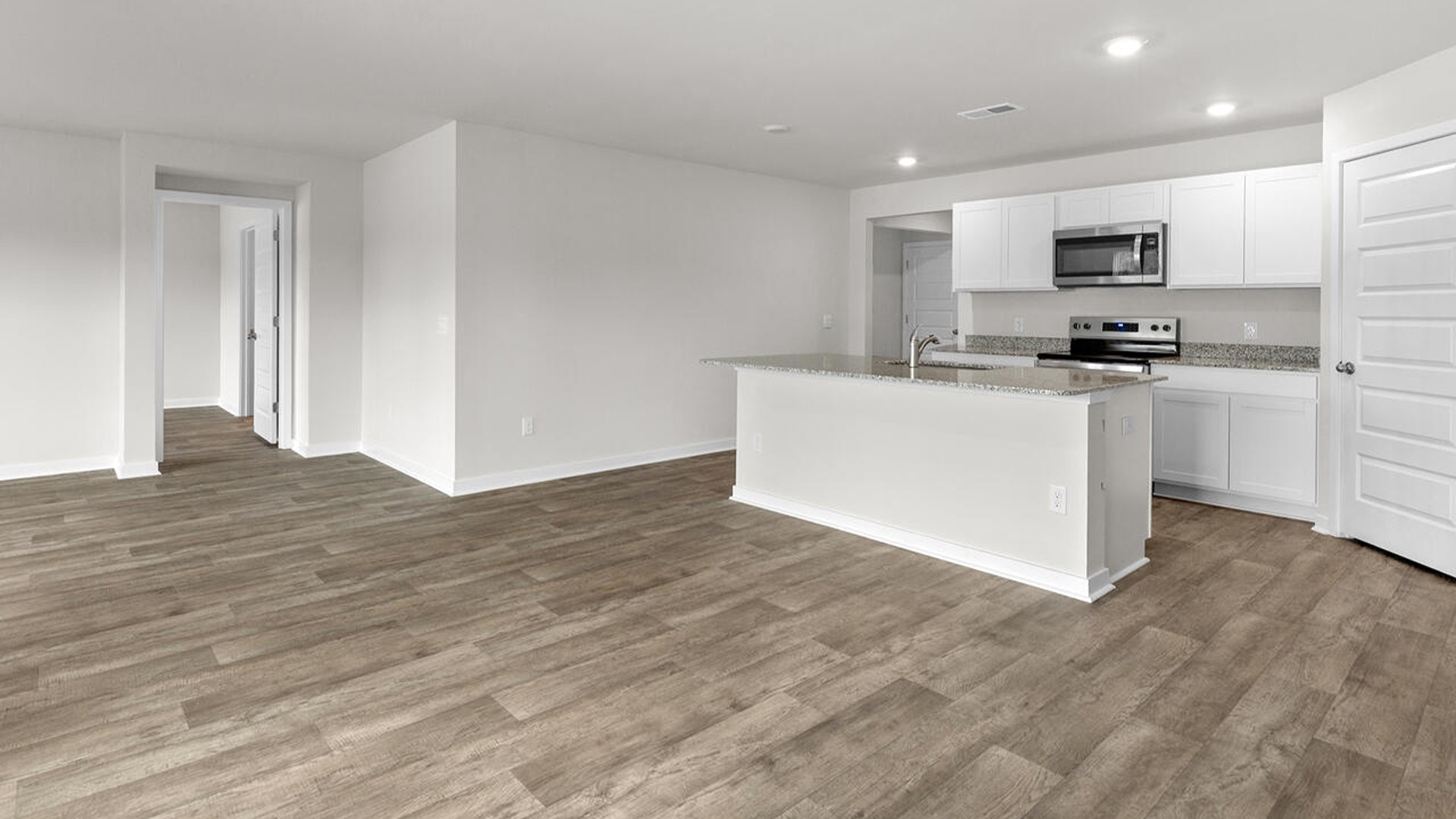 The living area is an open concept, where your kitchen, living, and dining areas blend seamlessly into a space perfect for everyday living and entertaining.