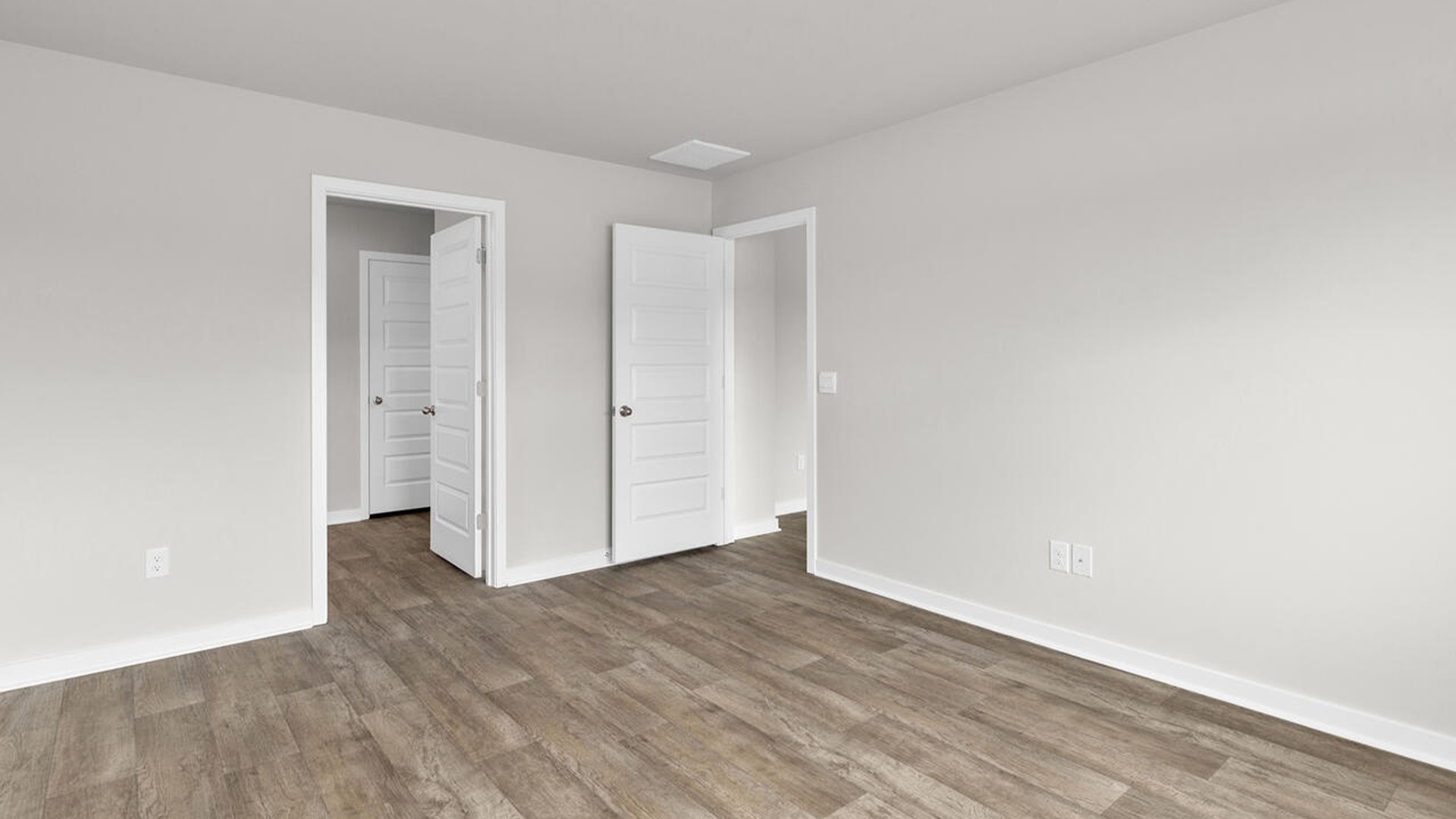 The primary bedroom has its own attached bathroom that features a walk-in closet and all the space you need to get ready in the morning.