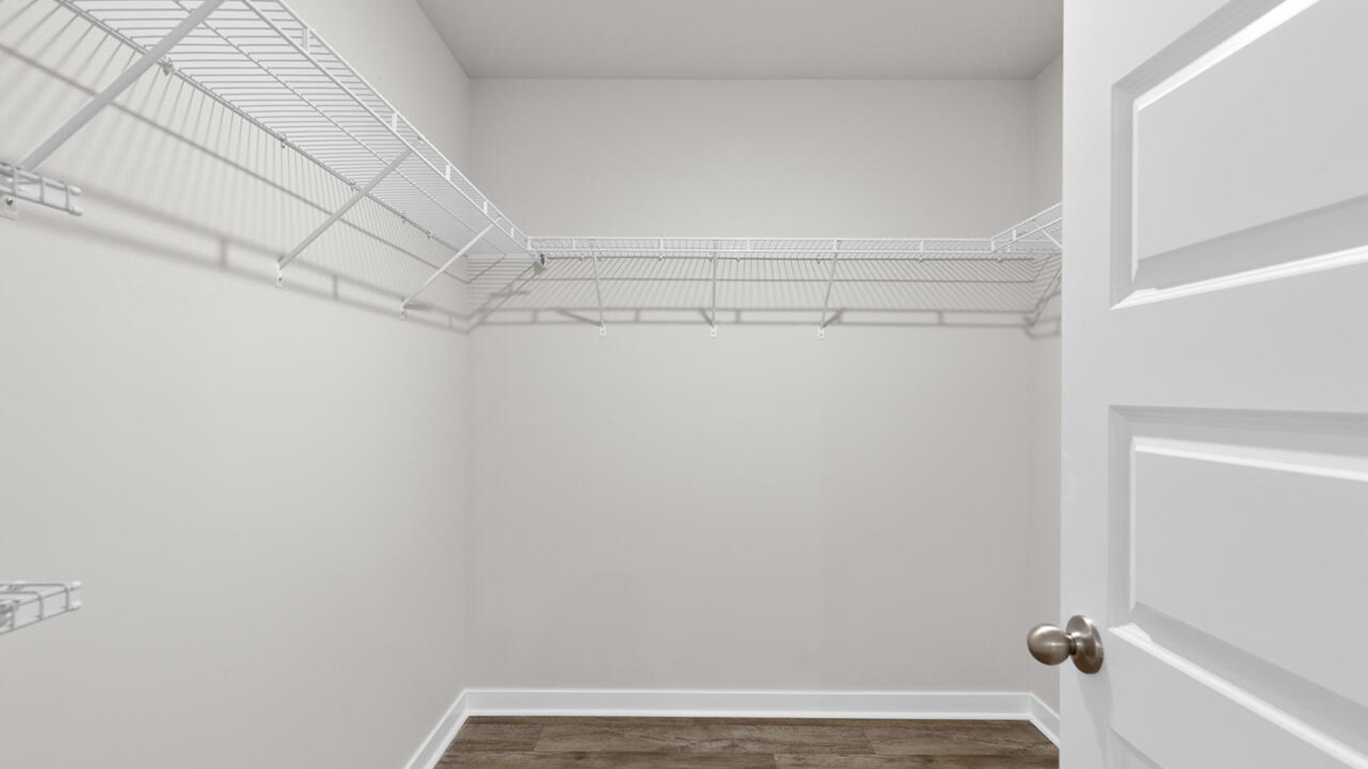 The primary bedroom has its own attached bathroom that features a walk-in closet and all the space you need to get ready in the morning.
