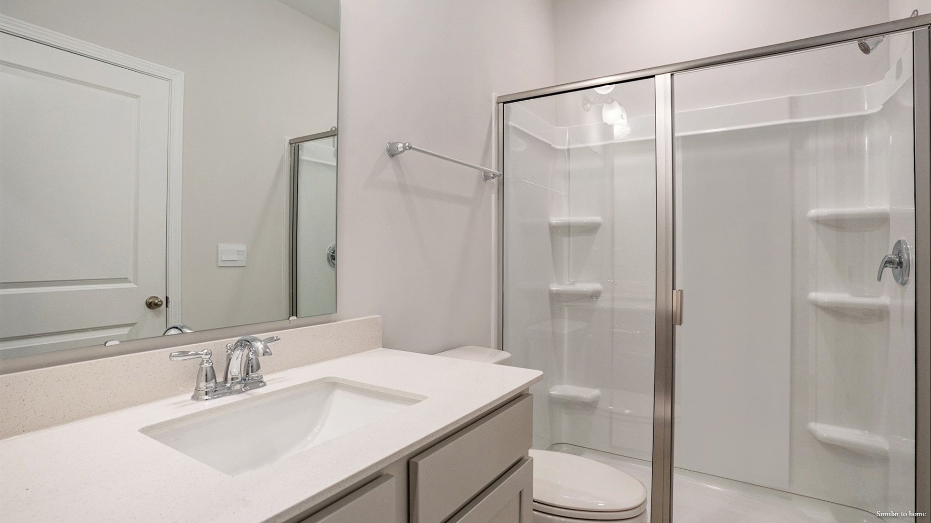 To the right of the Foyer, a hallway leads to bedroom, bath 2, and bedroom 2 This layout separates these rooms from the main living area. To the left of the main living area, past the breakfast nook, is bedroom 4 and bath 3.
