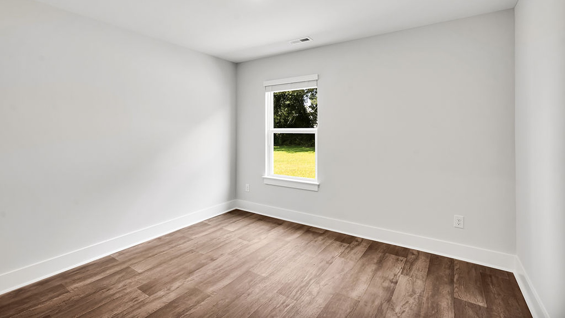 Downstairs, a flex room can be used as an office or sitting area.