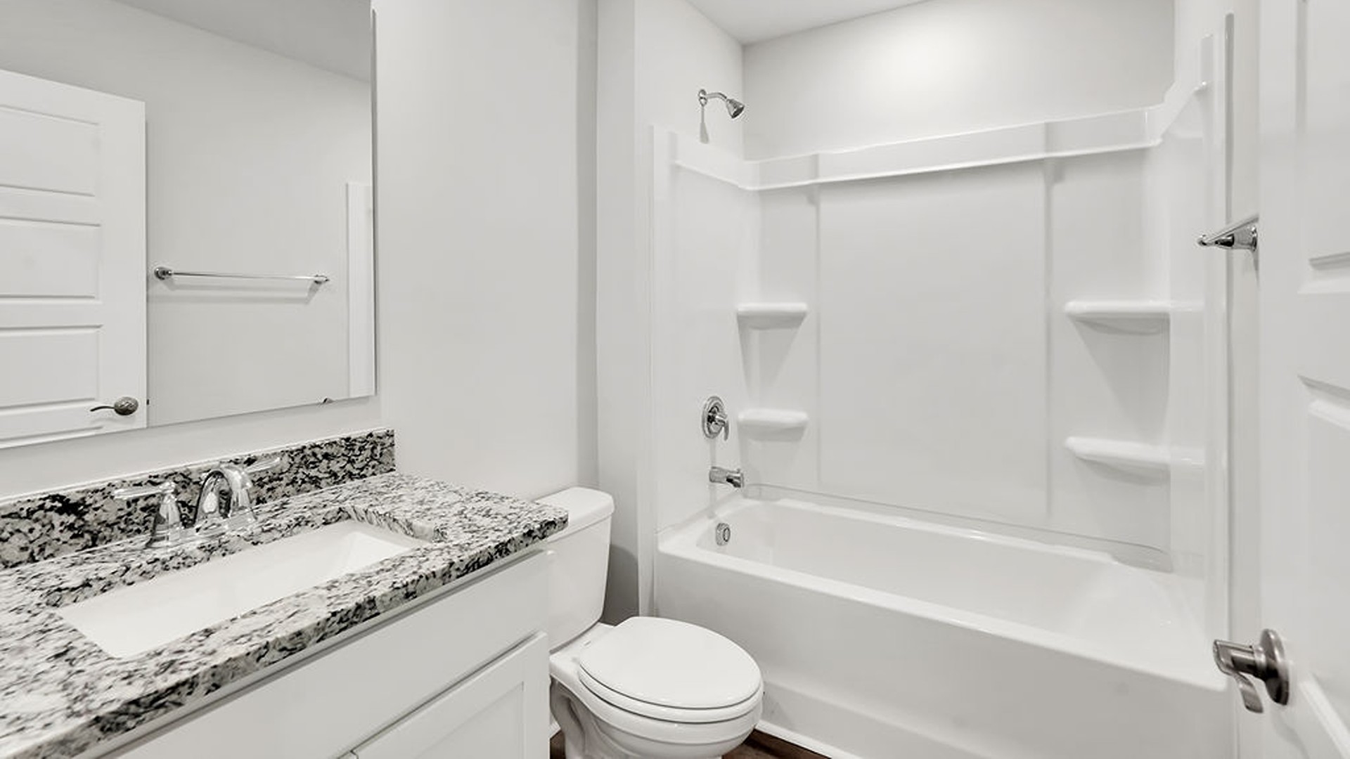 The upstairs has an additional living space, a laundry room, and a Primary Bedroom.