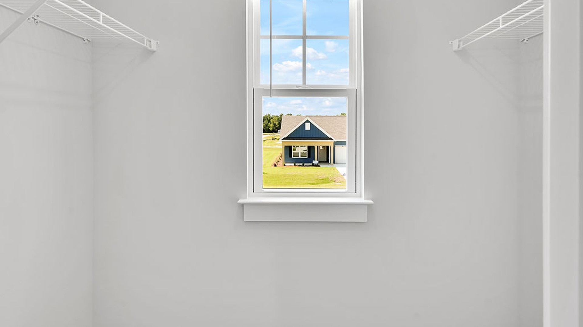 The upstairs has an additional living space, a laundry room, and a Primary Bedroom.