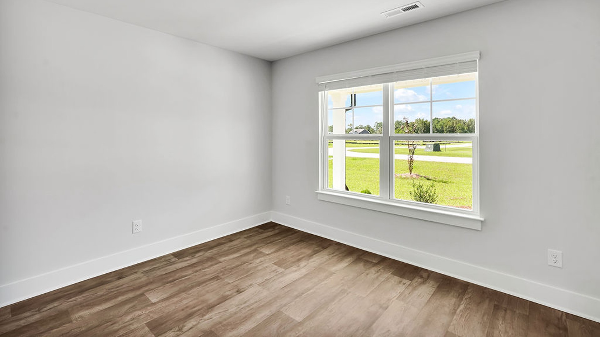 Downstairs, a flex room can be used as an office or sitting area.