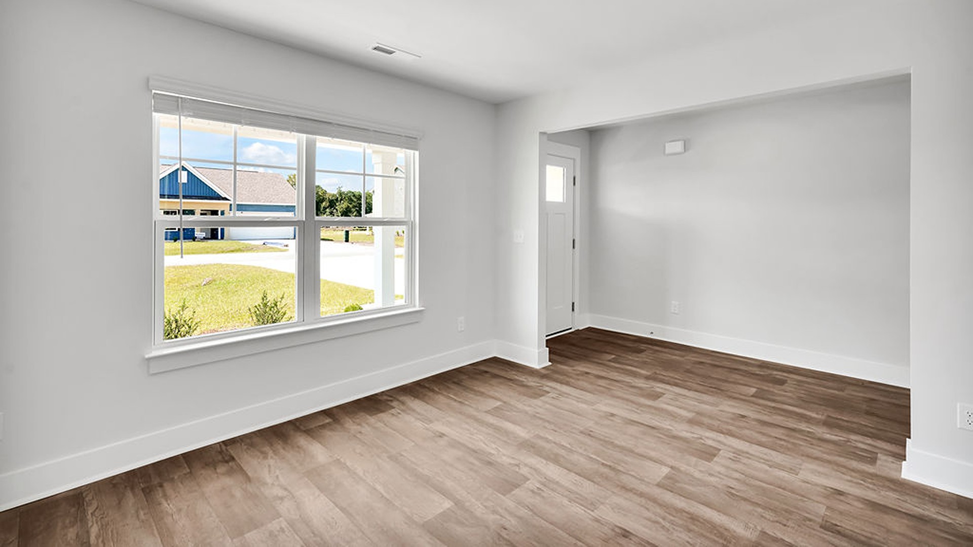 Downstairs, a flex room can be used as an office or sitting area.