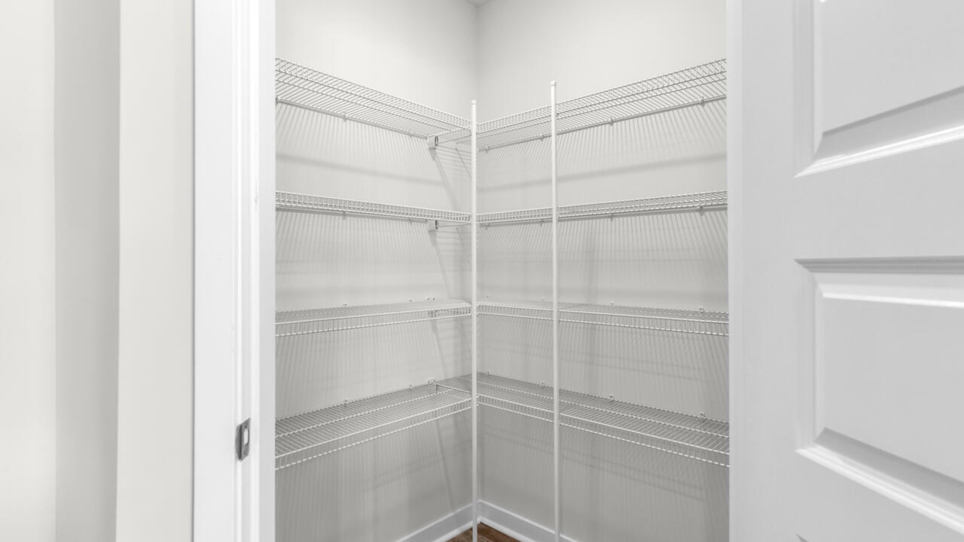 The open-concept kitchen features granite countertops and stainless-steel appliances.