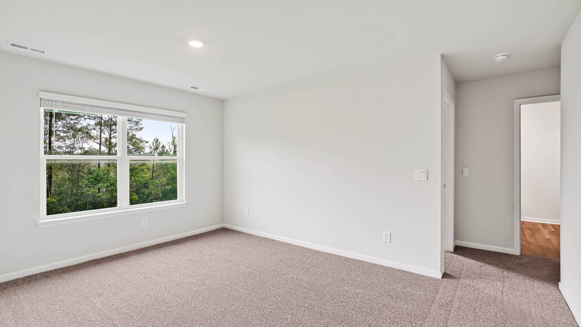 3 additional bedrooms and bathroom. In every bedroom you’ll have carpeted floors and a closet in each room. Whether these rooms become bedrooms, office spaces, or other bonus rooms, there is sure to be comfort.