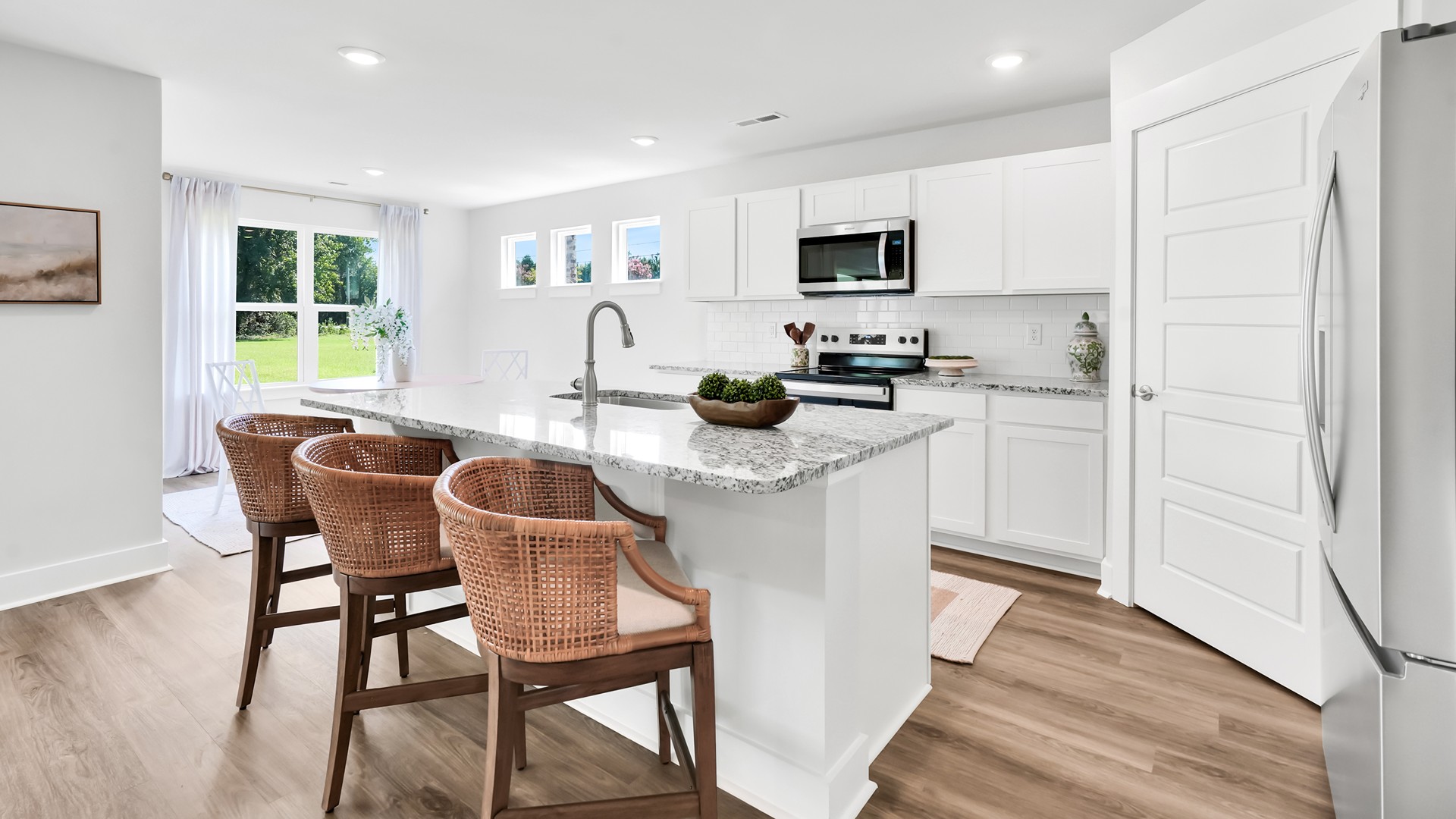 the Guilford is sure to turn heads. Inside this 5 bedroom, 4.5 bathroom home, you’ll find 3,503 square feet of comfortable living. The living area is an open concept, where your kitchen, living, and dining areas blend seamlessly into a space perfect for everyday living and entertaining.