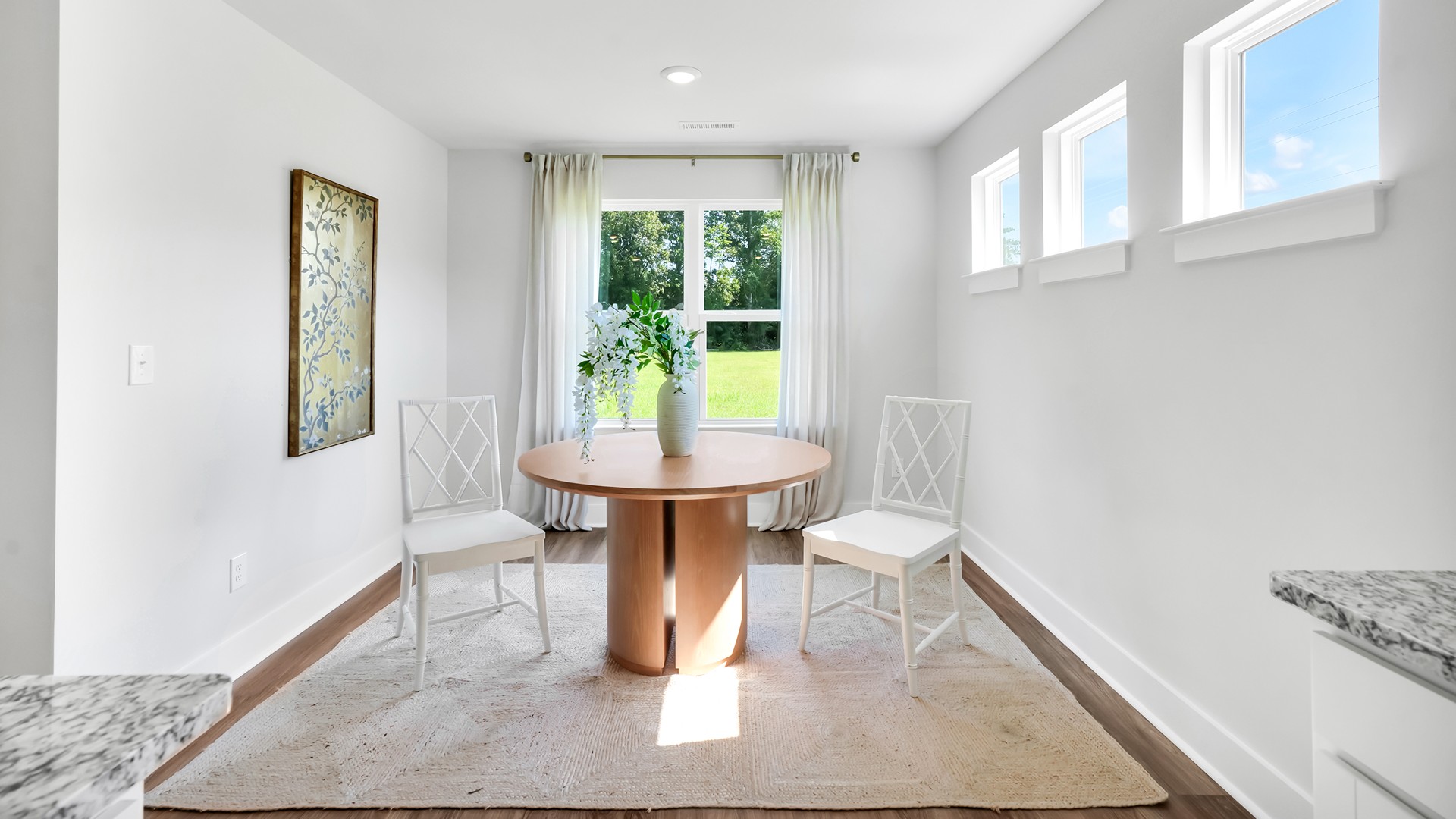 the Guilford is sure to turn heads. Inside this 5 bedroom, 4.5 bathroom home, you’ll find 3,503 square feet of comfortable living. The living area is an open concept, where your kitchen, living, and dining areas blend seamlessly into a space perfect for everyday living and entertaining.