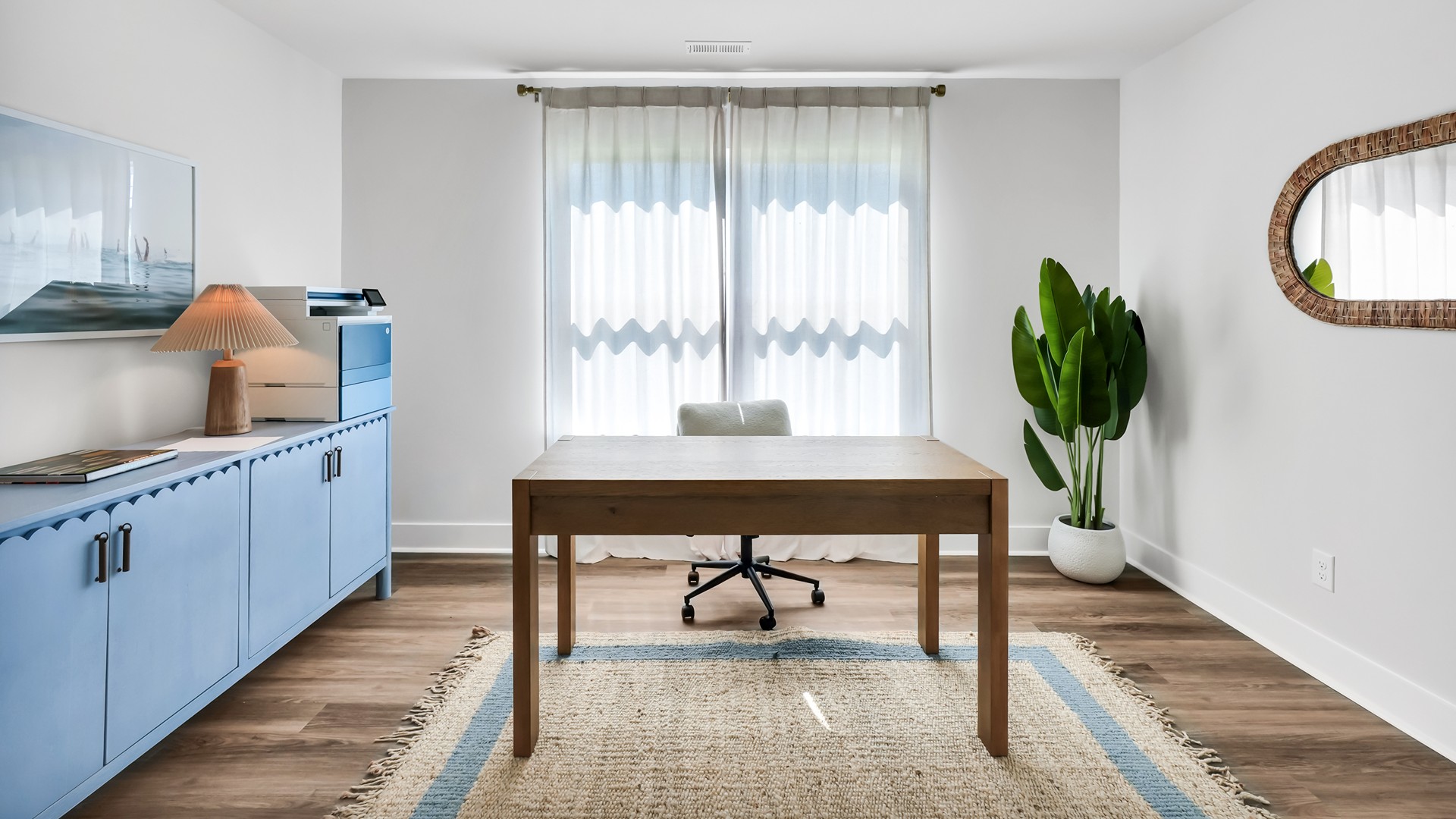 he main level is designed for both functionality and social gatherings, starting with a covered porch that leads into a foyer. From the foyer, you can access a two-car garage and a half bath