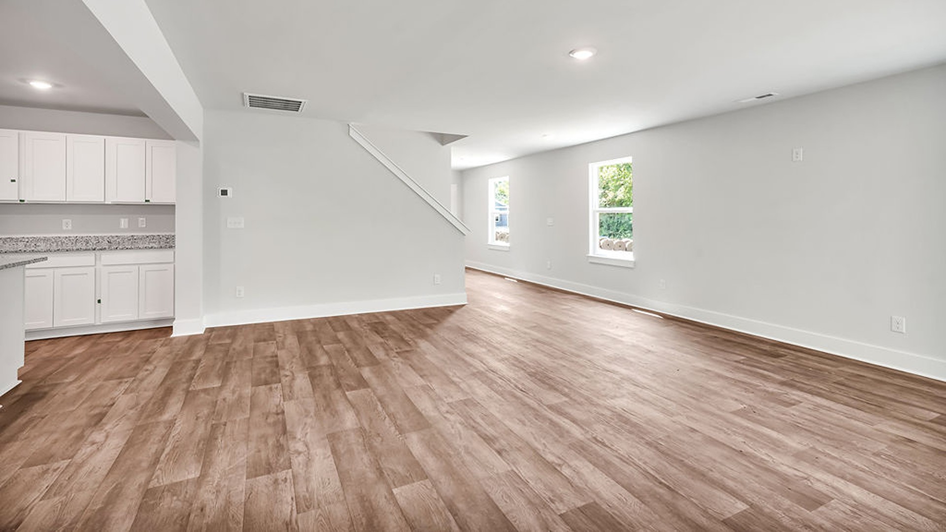 The living area is an open concept, where your kitchen, living, and dining areas blend seamlessly into a space perfect for everyday living and entertaining.