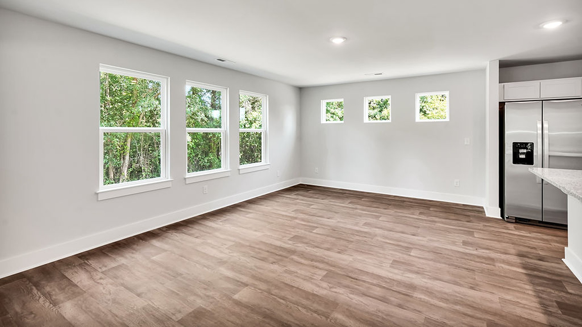 The living area is an open concept, where your kitchen, living, and dining areas blend seamlessly into a space perfect for everyday living and entertaining.