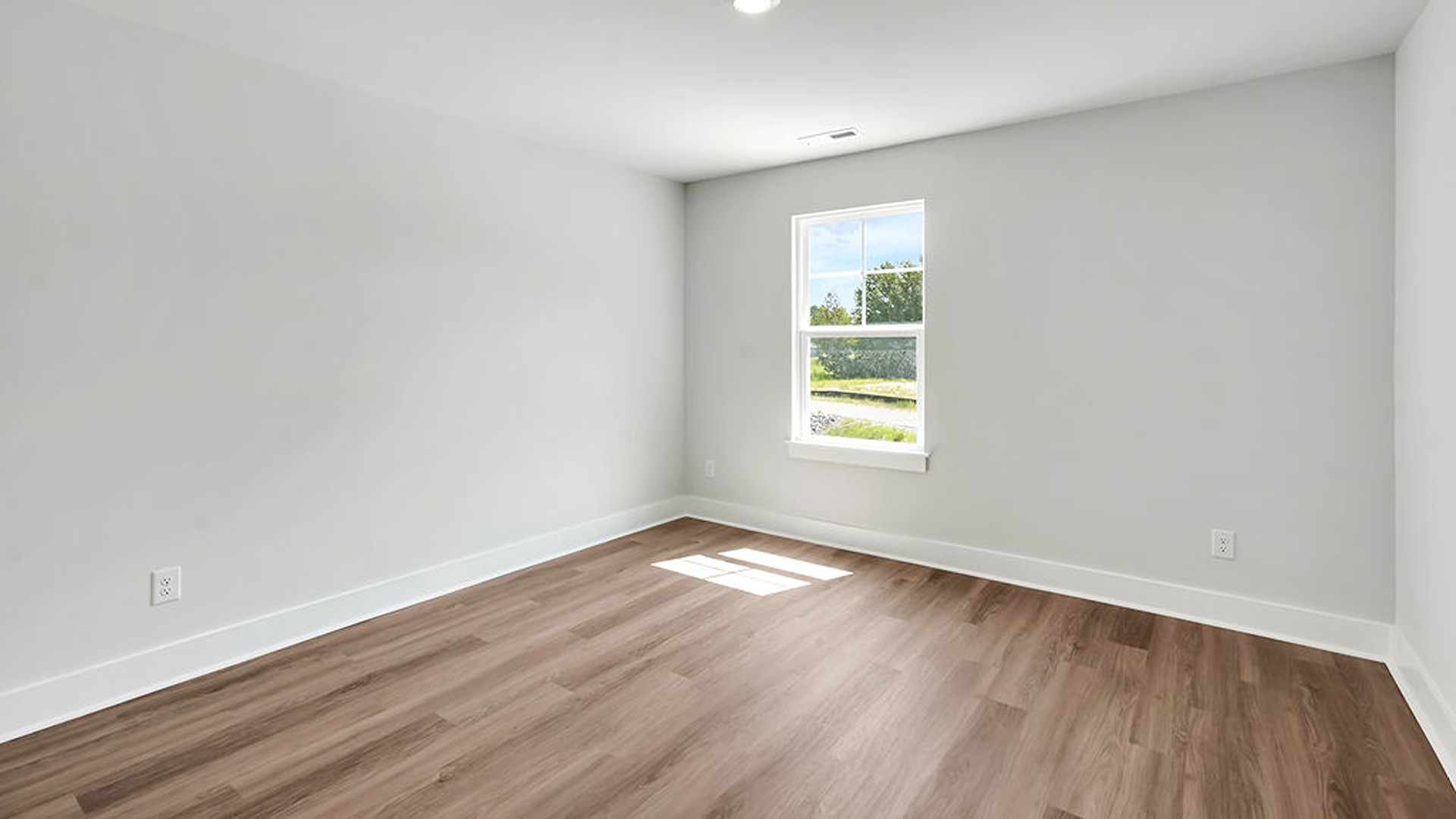 The Guilford second story provides a private living area separate from the main floor, which includes a large upstairs living room, the Primary Bedroom suite, and three additional bedrooms with shared access to bathrooms and laundry facilities